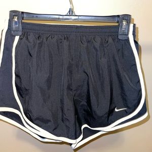 Black Nike running shorts